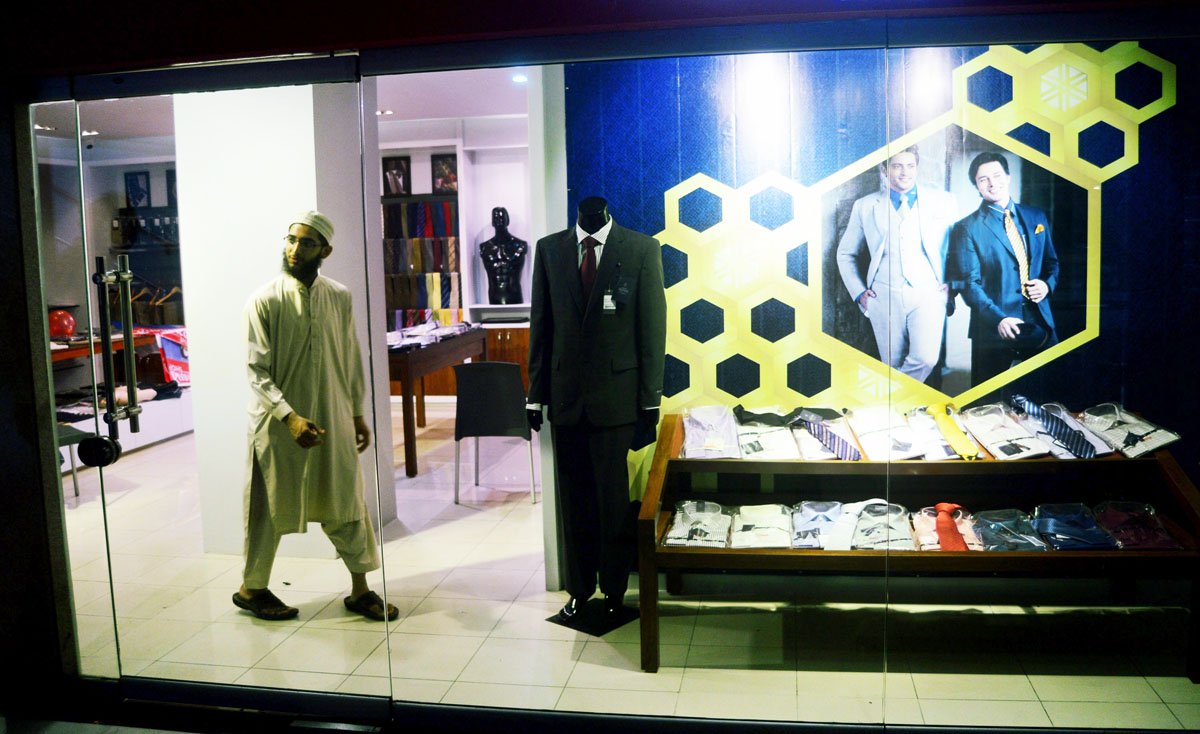 najmus saqib store director for the raymond shop in pakistan is pictured inside the store premises in karachi on june 21 2013 photo afp