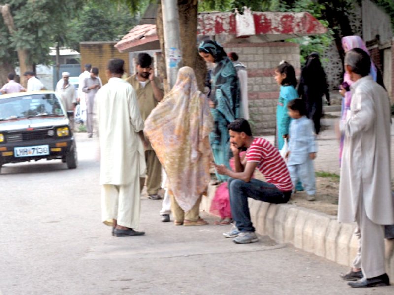 commuters wait for public transport which remained off roads on the second day of the strike photo inp