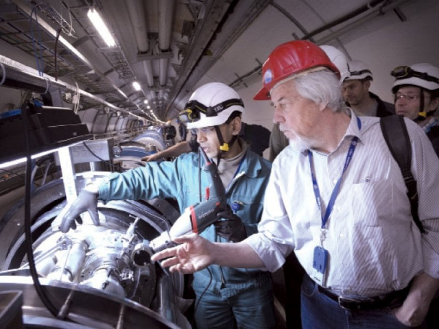 pakistani engineer amir aijaz left explains the repair work of the large hadron collider to cern director general rolf dieter heuer at cern in geneva photo courtesy dr hafeez hoorani pakistani engineer amir aijaz left explains the repair work of the large hadron collider to cern director general rolf dieter heuer at cern in geneva photo courtesy dr hafeez hoorani