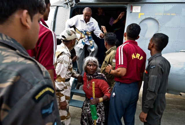 indian pilgrims evacuated from flood hit areas by the indian air force iaf arrive at the jolly grant airport in dehradun state capital of uttarakhand on june 21 2013 photo afp indian pilgrims evacuated from flood hit areas by the indian air force iaf arrive at the jolly grant airport in dehradun state capital of uttarakhand on june 21 2013 photo afp