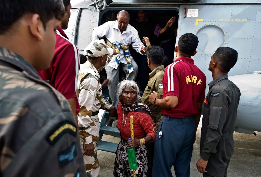 indian pilgrims evacuated from flood hit areas by the indian air force iaf arrive at the jolly grant airport in dehradun state capital of uttarakhand on june 21 2013 photo afp indian pilgrims evacuated from flood hit areas by the indian air force iaf arrive at the jolly grant airport in dehradun state capital of uttarakhand on june 21 2013 photo afp