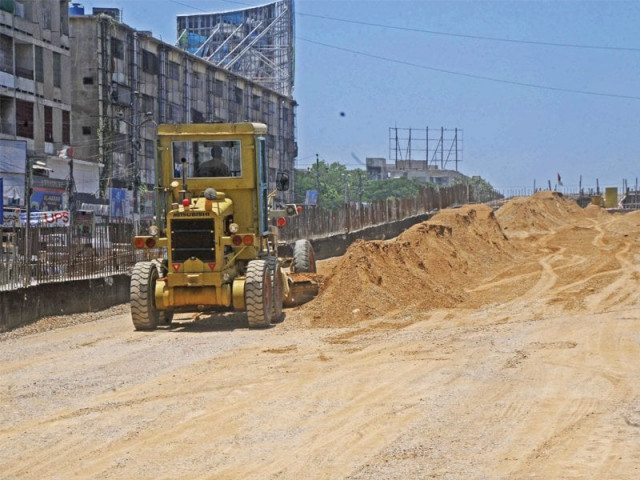 the under construction flyover at ayesha manzil is causing a lot of health problems according the residents and business owners of the vicinity photo mohammad saqib express the under construction flyover at ayesha manzil is causing a lot of health problems according the residents and business owners of the vicinity photo mohammad saqib express