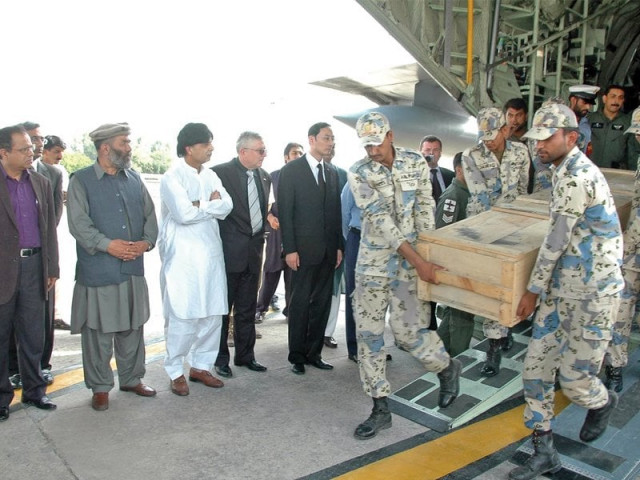 chaudhry nisar along with the chinese and ukrainian ambassadors receive bodies of the victims photo inp chaudhry nisar along with the chinese and ukrainian ambassadors receive bodies of the victims photo inp