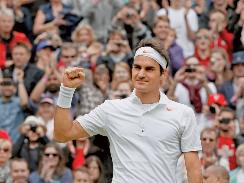 federer began his campaign for a record eighth wimbledon title in style taking just 69 minutes to storm past hanescu photo reuters