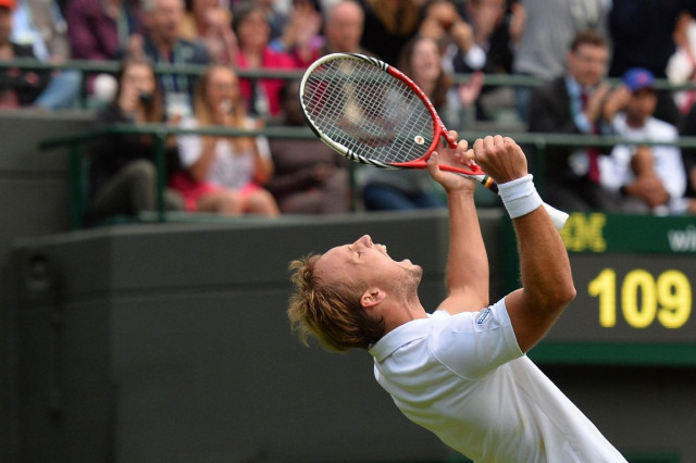 belgium 039 s steve darcis celebrates beating spain 039 s rafael nadal during their men 039 s first round match on day one of the 2013 wimbledon championships tennis tournament photo afp