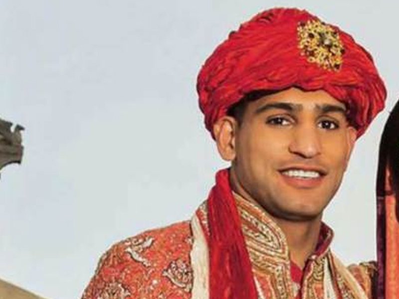 amir khan appeared to be over dressed for his wedding photo file