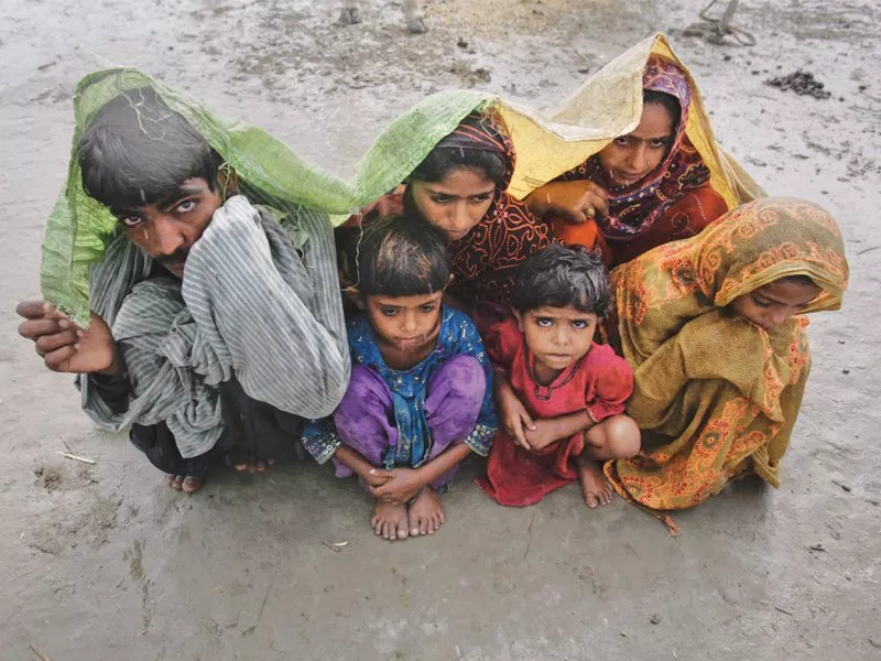 a family displaced by the 2011 floods uses a tarp to escape the monsoon downpour at a makeshift camp for flood victims in badin sida proposed a rs7 2 billion regional master plan and identified five investment projects to avert such disasters in the future photo file a family displaced by the 2011 floods uses a tarp to escape the monsoon downpour at a makeshift camp for flood victims in badin sida proposed a rs7 2 billion regional master plan and identified five investment projects to avert such disasters in the future photo file