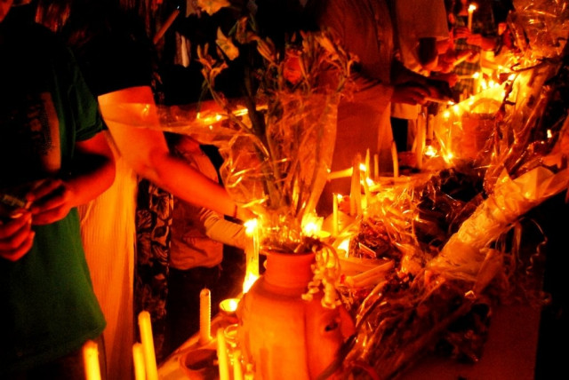 file photo of a candle light vigil photo sidrah moiz khan express file photo of a candle light vigil photo sidrah moiz khan express