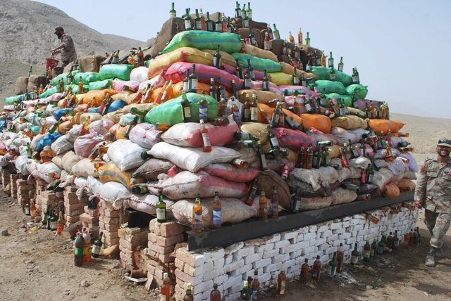 pakistani anti narcotics force anf personnel prepare to burn a pile of seized drugs in quetta on june 26 2013 officials burnt the contraband as part of international anti drug day photo afp