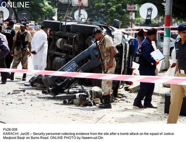 officials inspect the aftermath of a bomb attack on a sindh high court judge in karachi photo online officials inspect the aftermath of a bomb attack on a sindh high court judge in karachi photo online