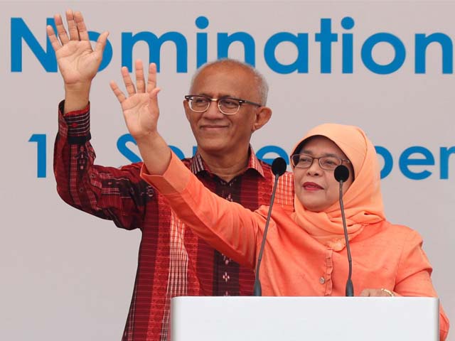 singapore 039 s president elect halimah yacob and her husband mohammed abdullah alhabshee address supporters before leaving the nomination centre in singapore september 13 2017 photo reuters