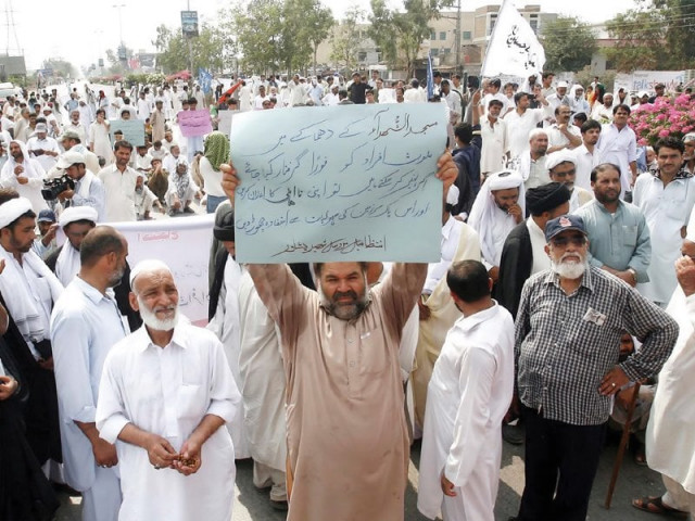 supporters of the imamia rabta council take to the streets in a protest against the attack on hussainia madrassah photo ppi