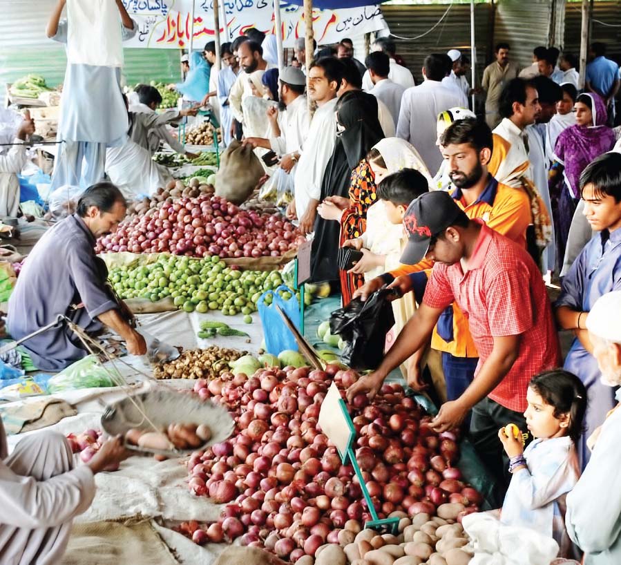 the bazaars and shops would supply 25 food items including fruits vegetables gram and flour at reduced prices photo file