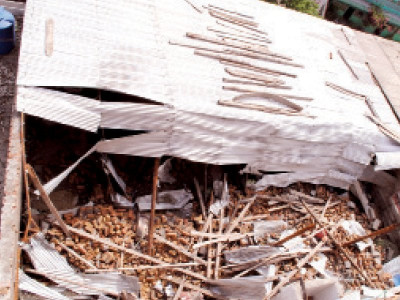 natural disaster two dead four hurt as roof caves in