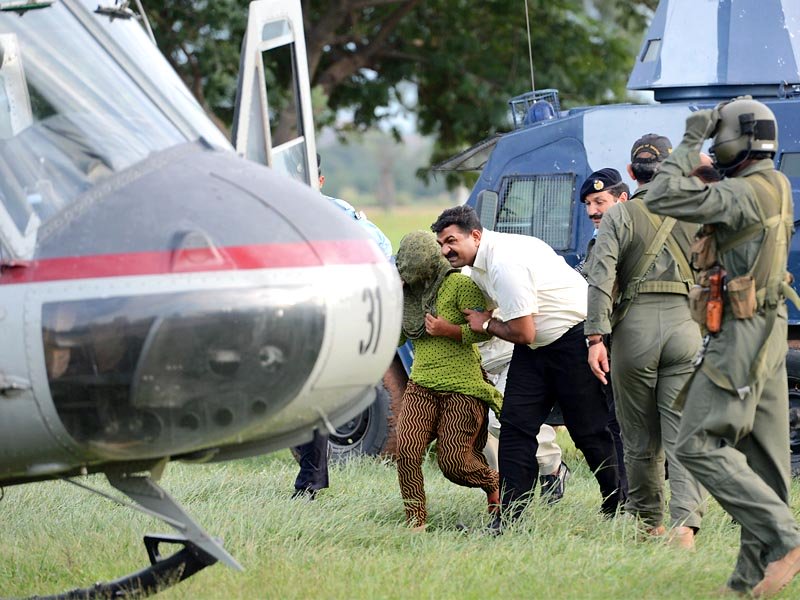 rimsha being transported to an undisclosed location after being granted bail photo afp file