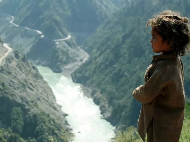 an indian child is seen near chenab river about 155 km northwest of jammu photo reuters an indian child is seen near chenab river about 155 km northwest of jammu photo reuters