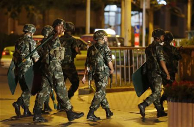 more than 100 people riding motorbikes and wielding knives attacked a police station in xinjiang more than 100 people riding motorbikes and wielding knives attacked a police station in xinjiang