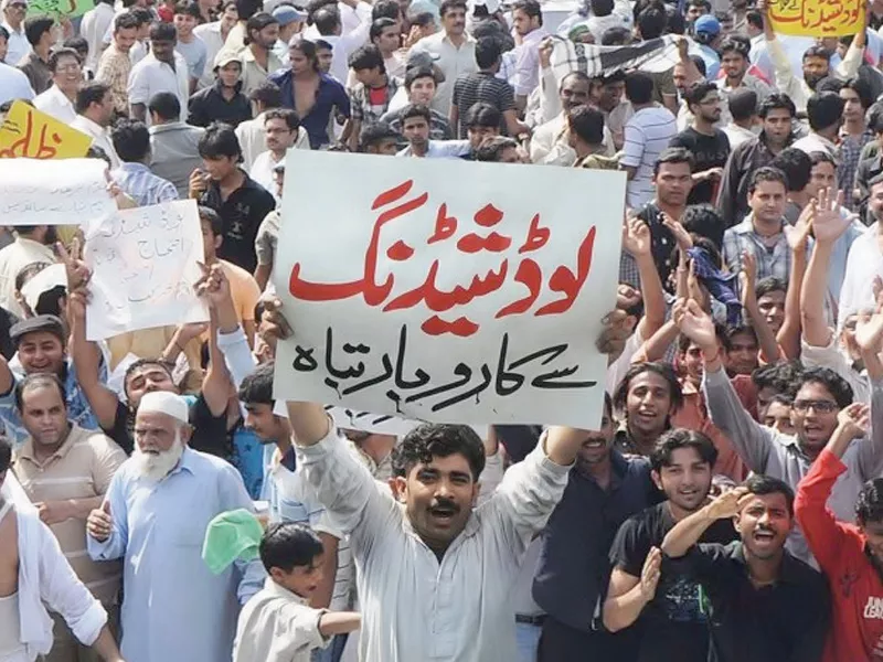 a man carries a placard which says load shedding destroys businesses 94 of the allocations decided today will go towards the power sector as the new govt scrambles to address the power crisis the most pressing problem faced by pakistan photo file a man carries a placard which says load shedding destroys businesses 94 of the allocations decided today will go towards the power sector as the new govt scrambles to address the power crisis the most pressing problem faced by pakistan photo file