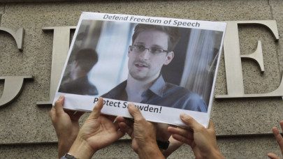 snowden denounces us seeks russia asylum