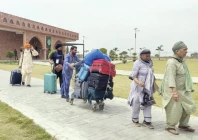 sikh pilgrims return to india via the wagah border after completing their 10 day stay in pakistan photo express