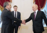 russian president vladimir putin shakes hands with iranian foreign minister abbas araghchi during a meeting at the boris yeltsin presidential library in saint petersburg photo reuters