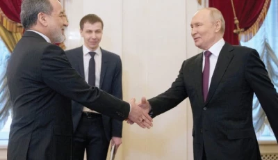 russian president vladimir putin shakes hands with iranian foreign minister abbas araghchi during a meeting at the boris yeltsin presidential library in saint petersburg photo reuters