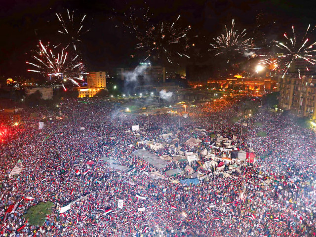 hundreds of thousands of anti mursi protesters in cairo s tahrir square erupted into wild cheering setting off fireworks and waving flags as general sisi ousted mursi photo reuters
