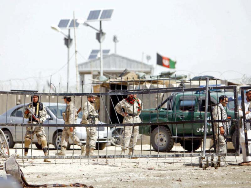 afghan security officials patrol the pak afghan border near chaman after the suicide blast photo ppi