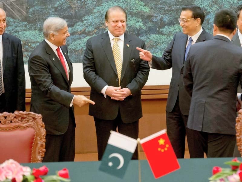 premiers nawaz sharif and li keqiang and punjab chief minister shahbaz sharif share a light moment photo afp