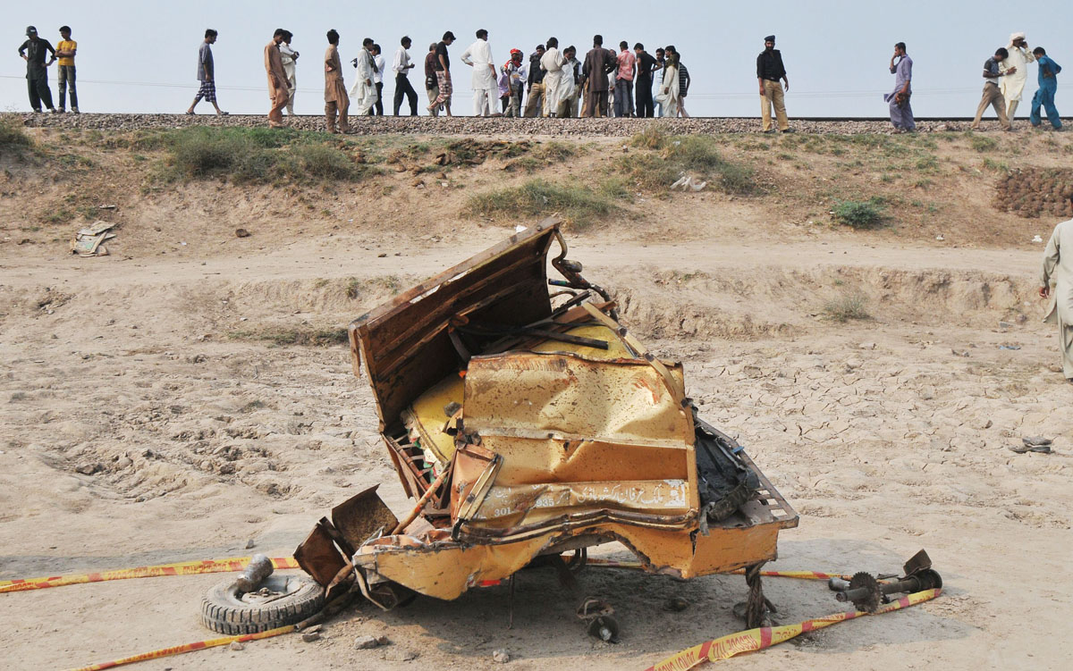 remains of the rickshaw which collided with the train in sheikhupura photo afp