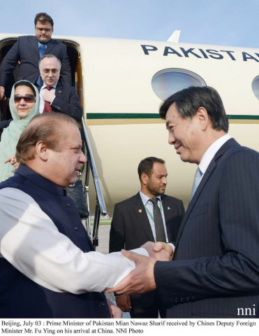 pm nawaz sharif received by chinese deputy foreign minister mr fu ying on his arrival at china photo nni pm nawaz sharif received by chinese deputy foreign minister mr fu ying on his arrival at china photo nni
