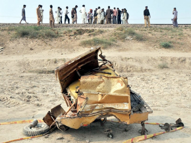 the mangled wreckage of a rickshaw after a train collided with the vehicle photo afp the mangled wreckage of a rickshaw after a train collided with the vehicle photo afp