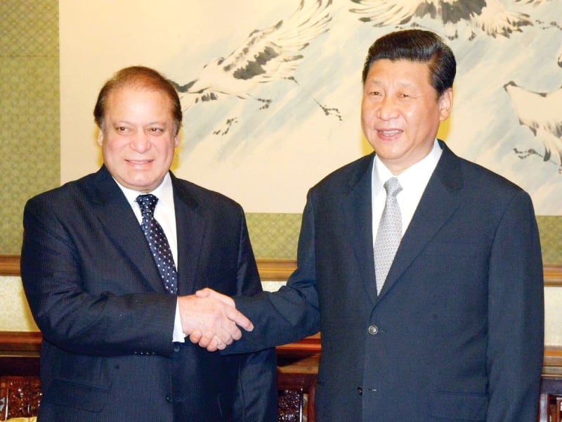 prime minister nawaz sharif shaking hands with chinese president xi jinping photo ppi