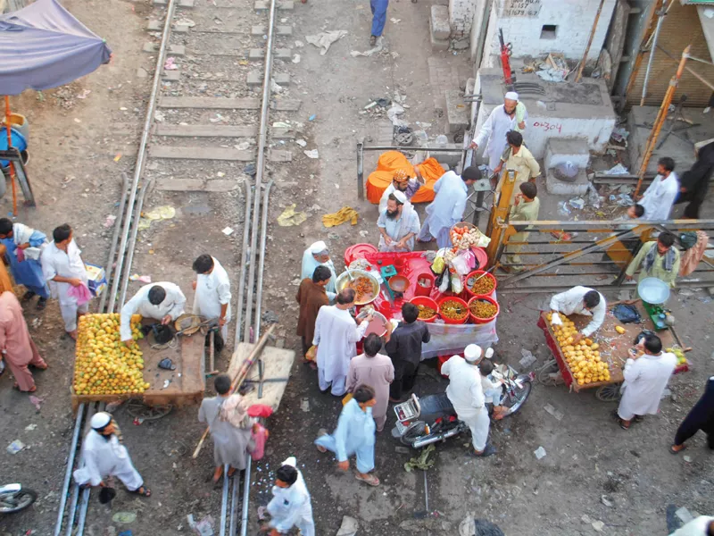 vendors usually set up their stalls under the faqirabad overhead bridge and sell vegetables fruits and other household commodities at low prices photo muhammad iqbal express vendors usually set up their stalls under the faqirabad overhead bridge and sell vegetables fruits and other household commodities at low prices photo muhammad iqbal express