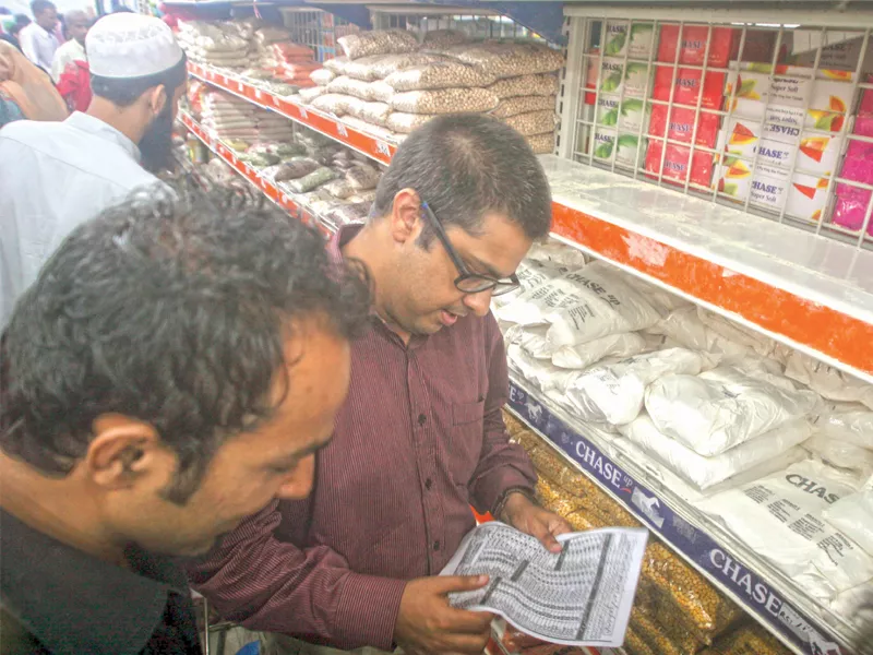 ferozabad assistant commissioner shahzeb shaikh checked the listed prices of commodities against the official prices issued by the government in different superstores in the area shaikh raided the stores on sunday as part of the administration s city wide drive against profiteers in the wake of ramazan photos athar khan express ferozabad assistant commissioner shahzeb shaikh checked the listed prices of commodities against the official prices issued by the government in different superstores in the area shaikh raided the stores on sunday as part of the administration s city wide drive against profiteers in the wake of ramazan photos athar khan express