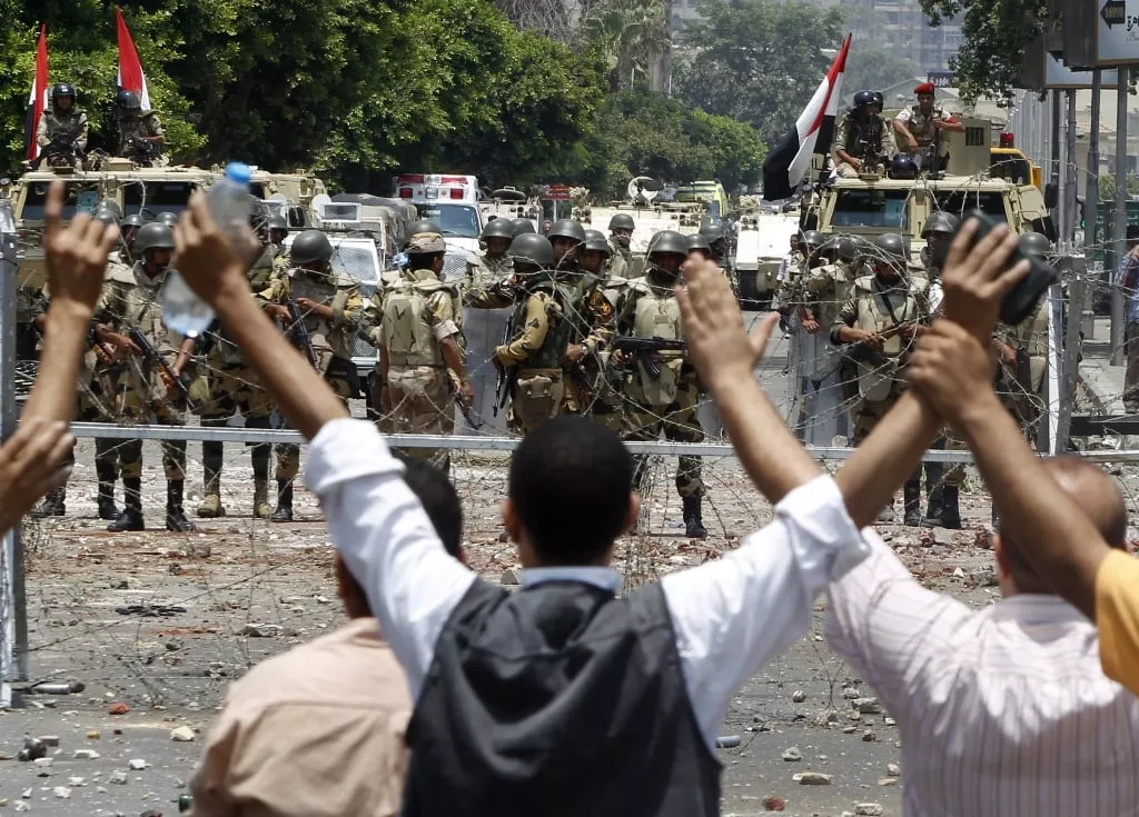 members of the muslim brotherhood and supporters of deposed egyptian president mohamed mursi shout slogans in front of army soldiers at republican guard headquarters in nasr city in the suburb of cairo july 8 2013 photo reuters members of the muslim brotherhood and supporters of deposed egyptian president mohamed mursi shout slogans in front of army soldiers at republican guard headquarters in nasr city in the suburb of cairo july 8 2013 photo reuters