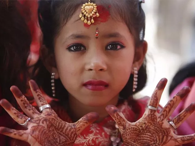 a newar girl shows her palms decorated with henna to the camera during an ihi ceremony photo reuters a newar girl shows her palms decorated with henna to the camera during an ihi ceremony photo reuters
