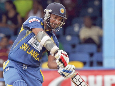 tri nation series sri lanka weather the storm to beat west indies