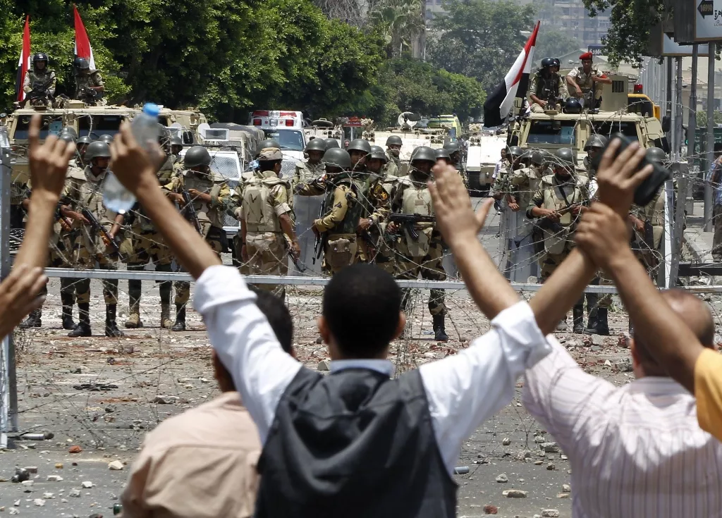 members of the muslim brotherhood and supporters of deposed egyptian president mohamed mursi shout slogans in front of army soldiers at republican guard headquarters in nasr city in the suburb of cairo july 8 2013 photo reuters members of the muslim brotherhood and supporters of deposed egyptian president mohamed mursi shout slogans in front of army soldiers at republican guard headquarters in nasr city in the suburb of cairo july 8 2013 photo reuters