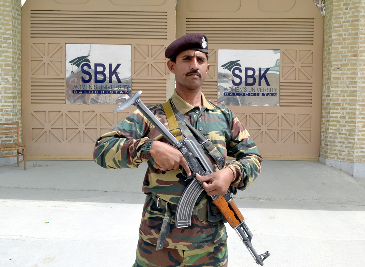 a security official standing outside the sbk women university photo naseem james