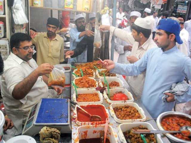 customers throng to buy pickles and related products at a shop in karimpura bazaar ahead of ramazan photo mohammad iqbal express