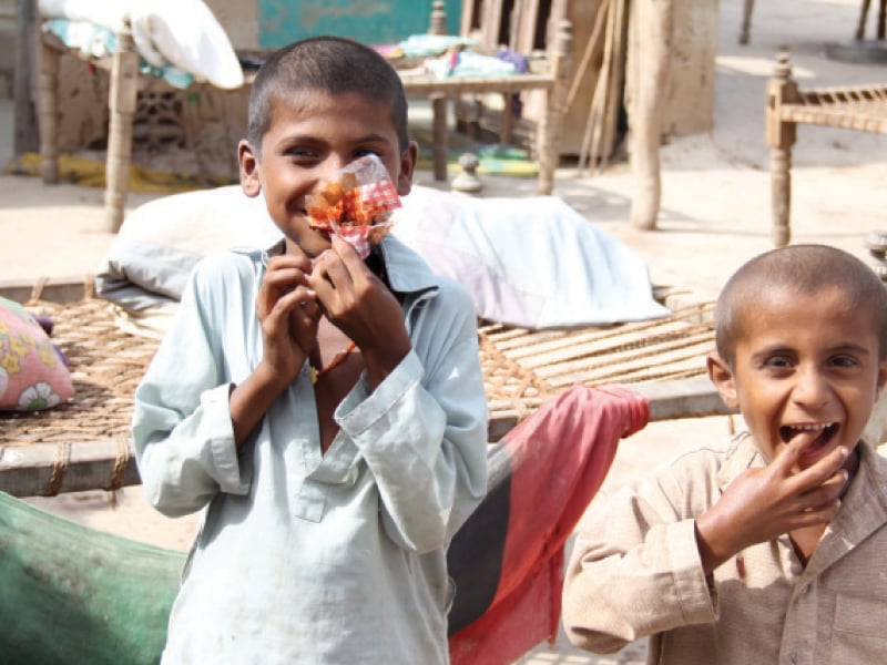 two minor boys and a woman of village bodo reedar samoon hooked on gutka chew the toxic substance photo express