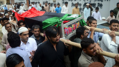 president s slain chief security officer laid to rest in karachi