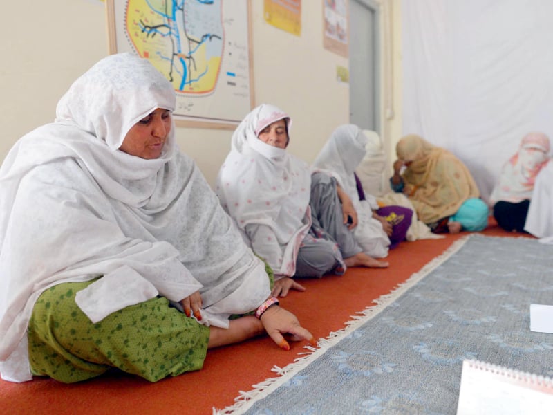 members of the women jirga attend a meeting photo afp