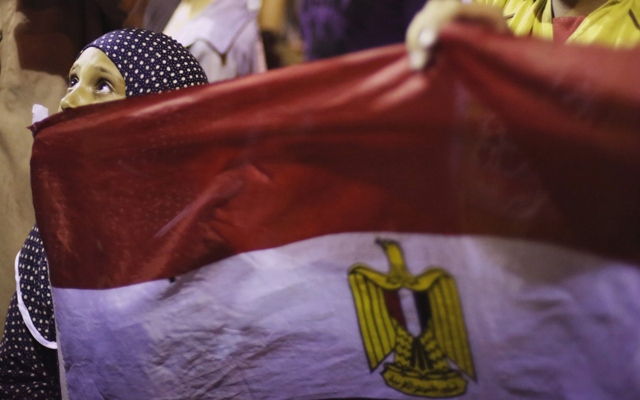 a girl holds egypt 039 s flag as she attends a sit in protest organized by supporters of the deposed egyptian president mohamed mursi in cairo july 11 2013 photo reuters