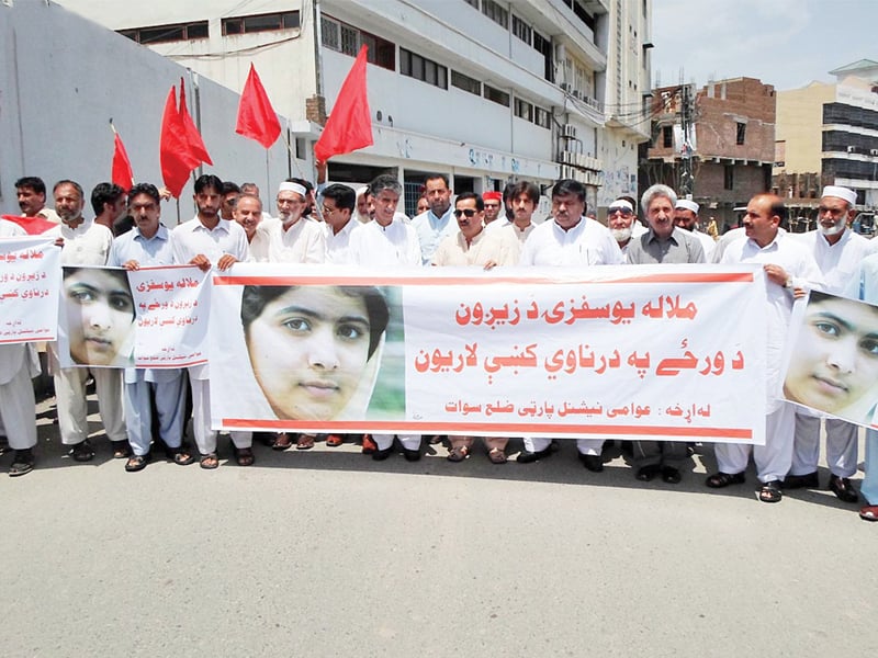 participants chant slogans in favour of malala at a rally photo online