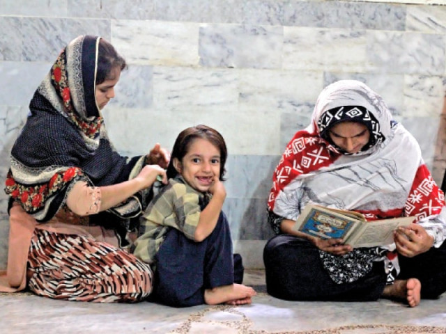 the kutchi jamaat khana in lyari currently shelters 500 people belonging to rahimabad mandhra mohalla and other adjoining areas in its spacious community hall and classrooms on the first floor photo ayesha mir express