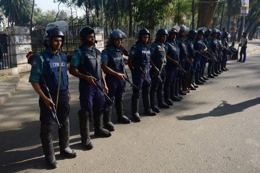 bangladeshi police stand guard outside the international crimes tribunal court in dhaka photo afp