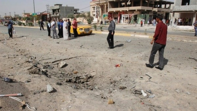 residents suspect the site of the bomb attack photo reuters residents suspect the site of the bomb attack photo reuters