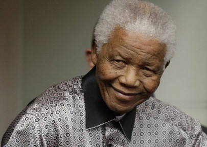 mandela steadily improving as he turns 95 in hospital
